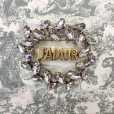 Christian Dior Broche con motivo JADIOR y ribete de diamantes marquesa