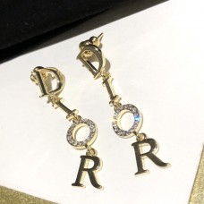 Christian Dior Dangle Logo Diamantes Colgante Mujer Pendientes largos con borlas chapados en oro amarillo
