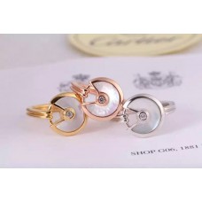 Anillo Amulette de Cartier de Nácar Blanco con Diamante en Oro Amarillo, Oro Blanco y Oro Rosa