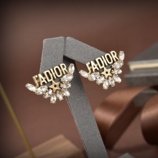 Christian Dior Aretes con diamantes y gotas de agua con detalle de estrella y motivo de latón Dior JADIOR