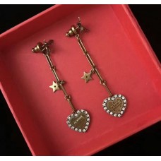 Dior LAmour Avenir Pendientes largos con colgante de corazón de cristal blanco y abeja de latón Canadá