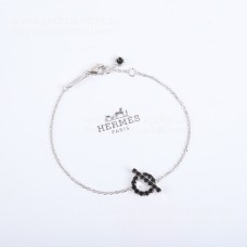 Pulsera Hermes Finesse en oro blanco y piedras preciosas de espinela negra