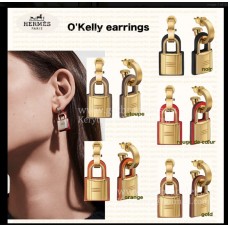 Pendientes Hermes OKelly de piel de becerro Swift con baño de oro amarillo