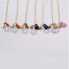 Colgante Hermes OKelly en piel de becerro Swift con herrajes chapados en oro