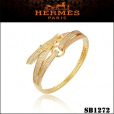 Pulsera Hermes Debridee de oro con diamantes