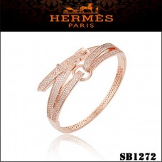 Pulsera Hermes Debridee en oro rosa con diamantes