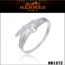 Pulsera Hermes Debridee de oro blanco con diamantes