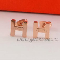 Pendientes Hermes H en Oro rosa