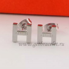 Pendientes Hermes H en Oro blanco