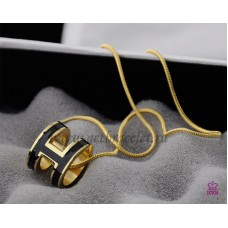 Hermes 3D Pop “H” Collar negro con logo de hueso de serpiente en oro amarillo