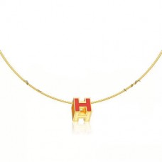 Collar Hermes Cage dH Naranja en oro amarillo lacado