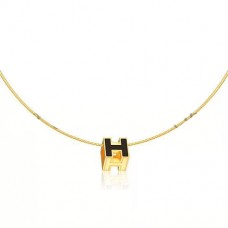 Collar Hermes Cage dH negro en oro amarillo lacado