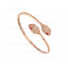 Brazalete Bvlgari Serpenti de oro rosa de 18 quilates con ojos de rubelita y pavé de diamantes