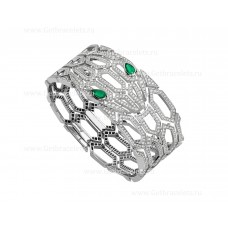 Brazalete Bvlgari Serpenti de oro blanco de 18 quilates engastado con ojos de esmeralda y pavé completo de diamantes