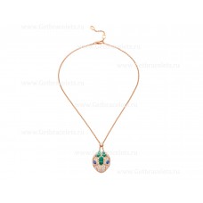 Collar Bvlgari Serpenti de oro rosa de 18 quilates con ojos de zafiro azul, elementos de malaquita y pavé de diamantes en el colgante