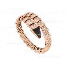 Brazalete de una bobina Bvlgari Serpenti Viper en oro rosa de 18 quilates engastado con pavé de diamantes y un elemento de ónix en la cabeza