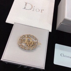 Broche ovalado con ribete de cristales blancos y motivo de logotipo de latón Christian Dior