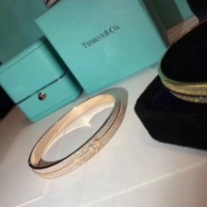 Brazalete Tiffany T con dos cristales clonados con bisagras finas en plata, rosa y oro amarillo para mujer