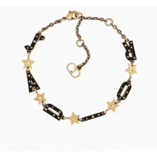 Christian Dior Jadior pulsera con motivo de logotipo negro y estrella de latón amarillo Precio